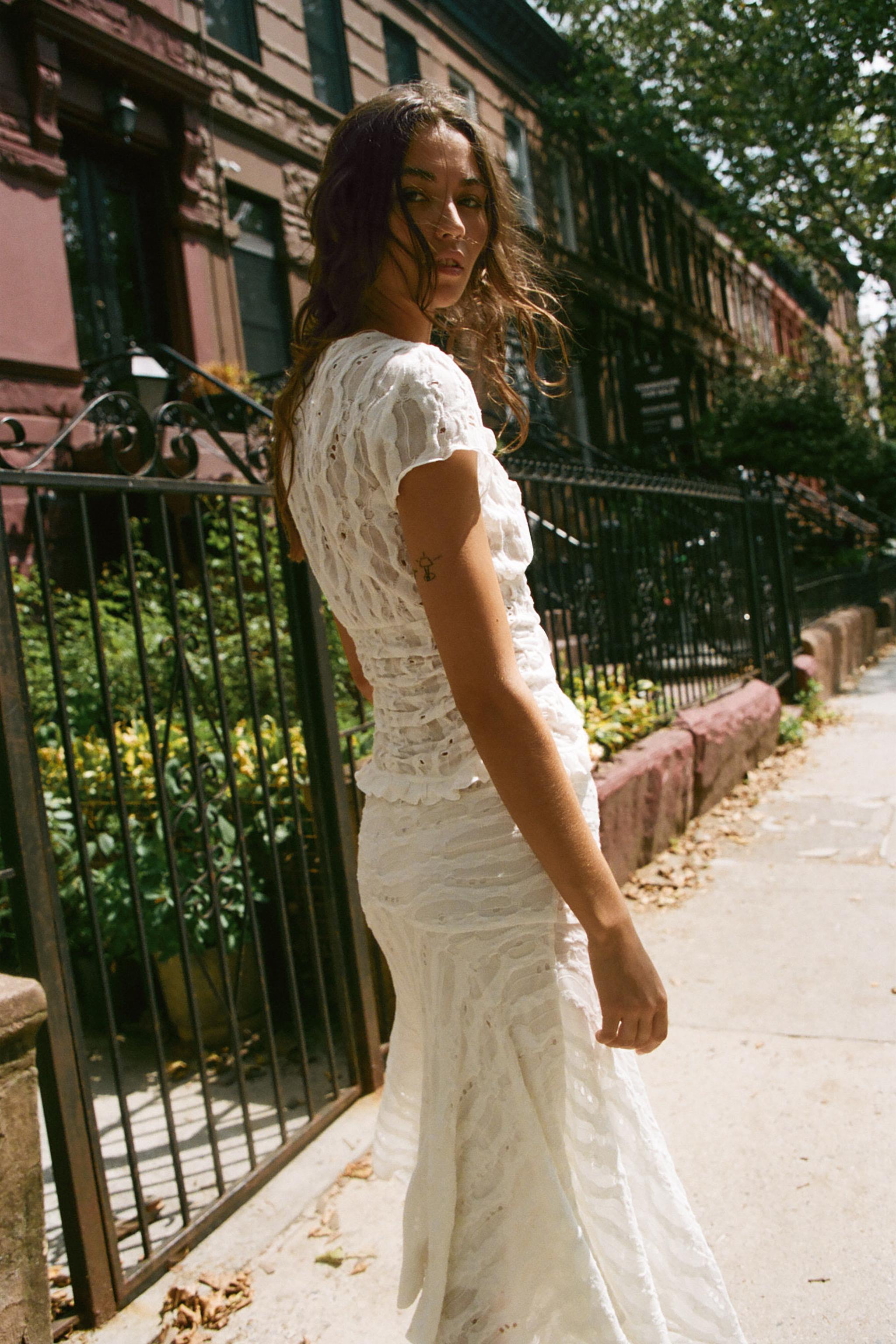 ASYMMETRIC RIPPED MIDI SKIRT